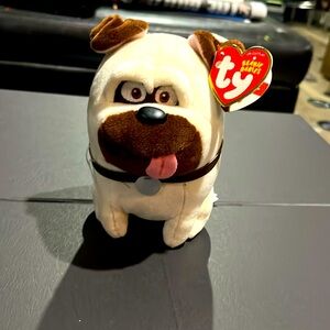 1 MEL the dog TY beanie baby DOG.   With tags.  Name.  Etc.